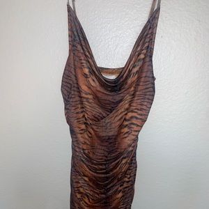 Tiger print dress with ruching on the sides. Best fit for A and B cup.